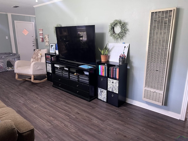 204 Mount Sylvan St, Lindale, TX 75771 - living area with a heating unit, wood finished floors, and crown molding