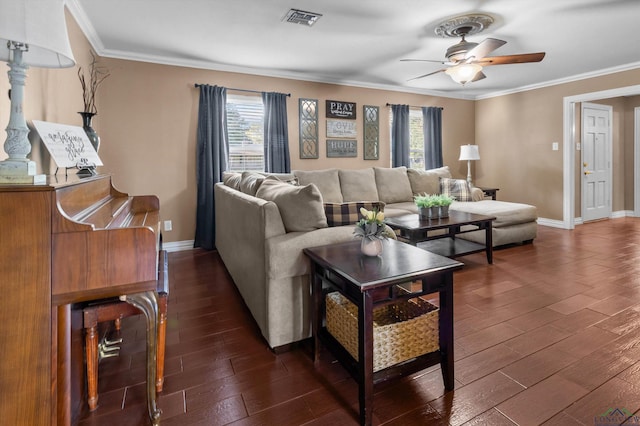 living room with ceiling fan, crown molding, and dark wood-type flooring