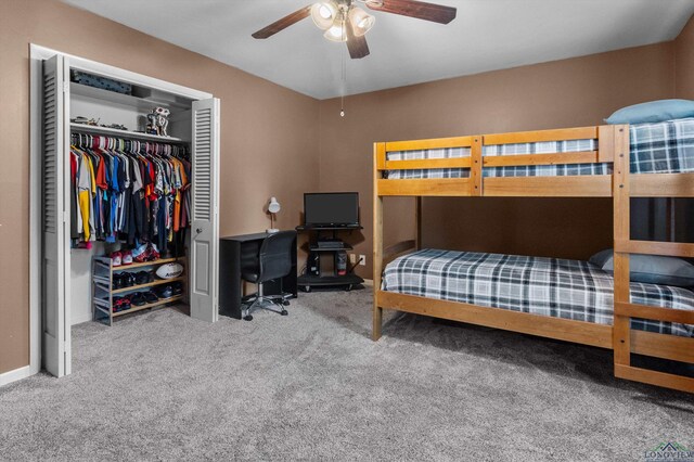 bedroom with carpet floors, a closet, and ceiling fan