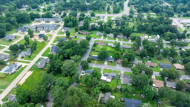 1130 Oakwood St, Carthage, TX 75633 - view of property location with nearby suburban area and a tree filled landscape