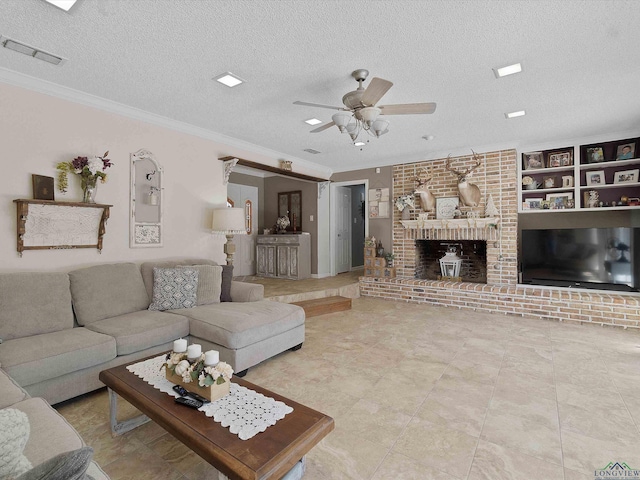 living room featuring crown molding, ceiling fan, a textured ceiling, and a brick fireplace