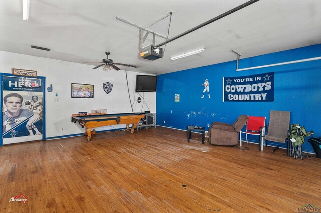 living area featuring ceiling fan, billiards, and hardwood / wood-style flooring