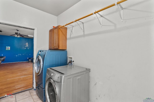 washroom with separate washer and dryer, ceiling fan, and light tile patterned flooring