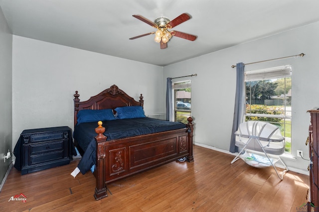 bedroom featuring ceiling fan and hardwood / wood-style floors