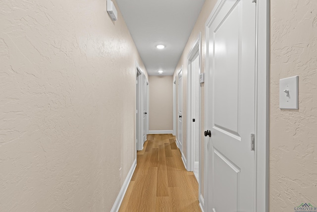 hall featuring light hardwood / wood-style flooring