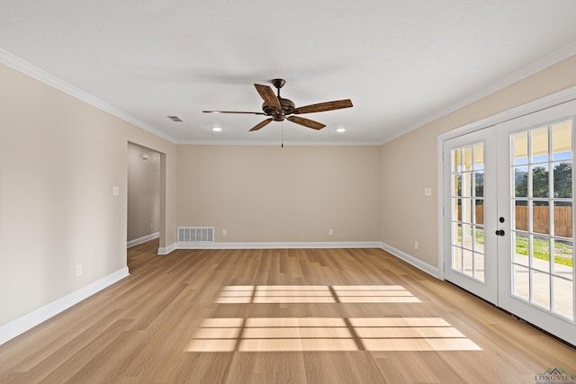 spare room with french doors, light wood-type flooring, ceiling fan, and crown molding