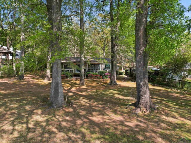 3065 E Lake, Gladewater, TX 75647 - view of front of house featuring a porch