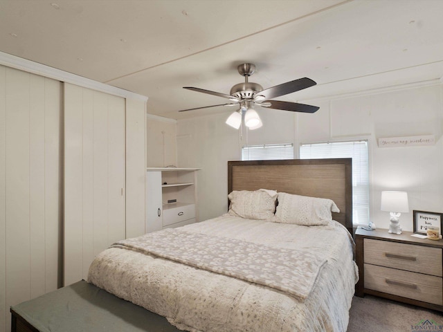 3065 E Lake, Gladewater, TX 75647 - bedroom featuring a closet, a ceiling fan, and light carpet
