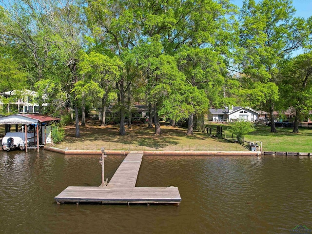 3065 E Lake, Gladewater, TX 75647 - dock area with a water view and view of wooded area