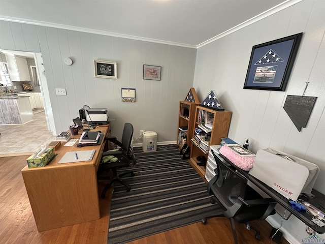 office space featuring crown molding and hardwood / wood-style floors