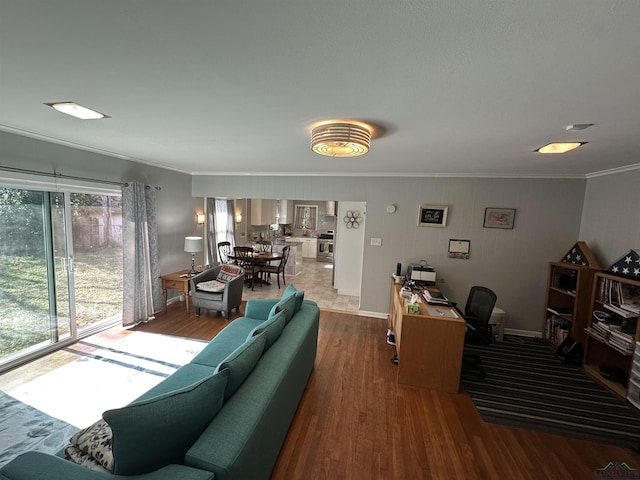 living room featuring hardwood / wood-style flooring and ornamental molding