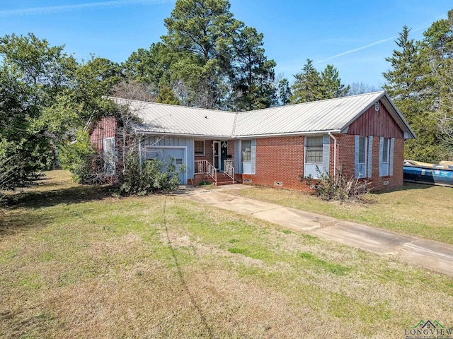 ranch-style house with a garage and a front lawn