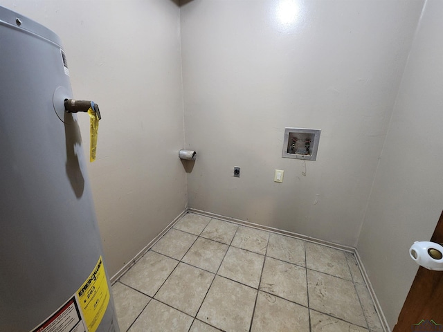 clothes washing area with laundry area, light tile patterned floors, hookup for a washing machine, hookup for an electric dryer, and water heater