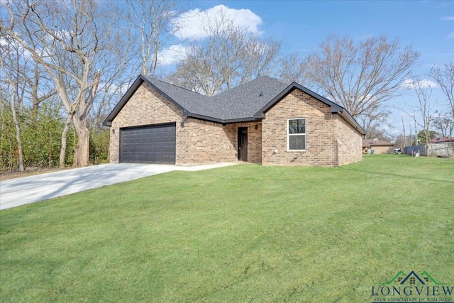 view of front of property with a front lawn and a garage