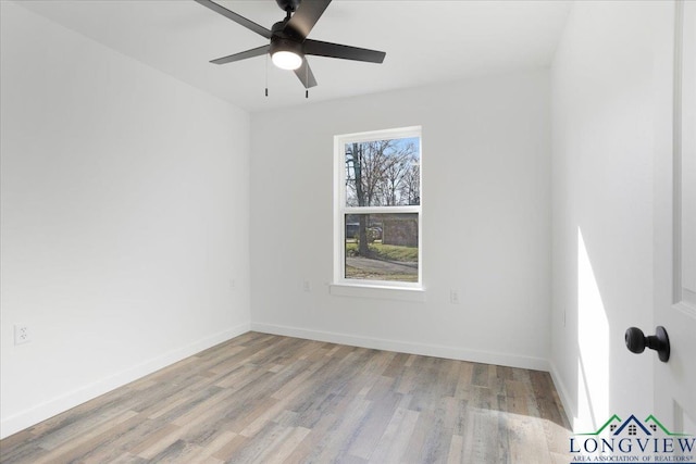 empty room with light hardwood / wood-style floors and ceiling fan