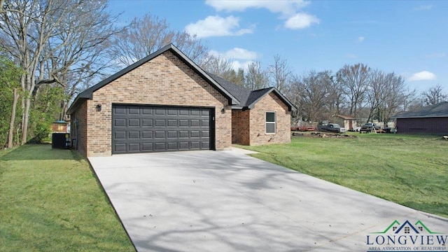 view of front of house with central AC, a front lawn, and a garage