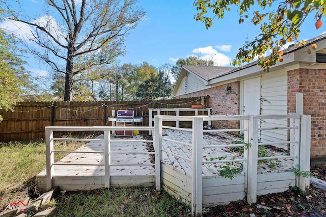 exterior space featuring a wooden deck