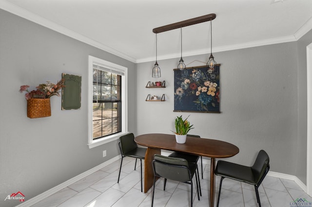 dining space with ornamental molding