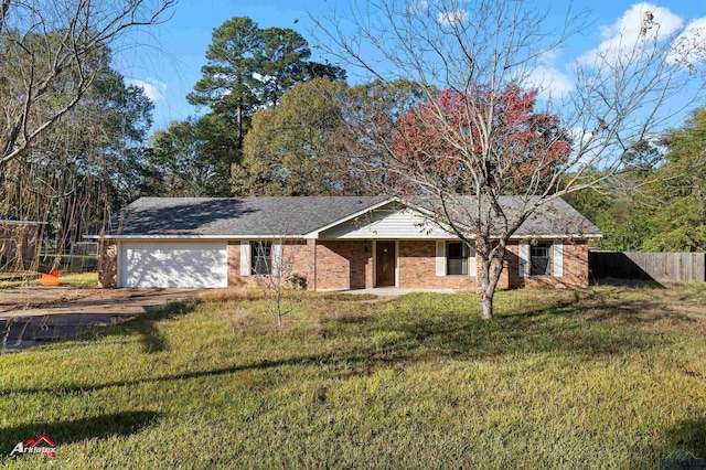 single story home with a front yard and a garage