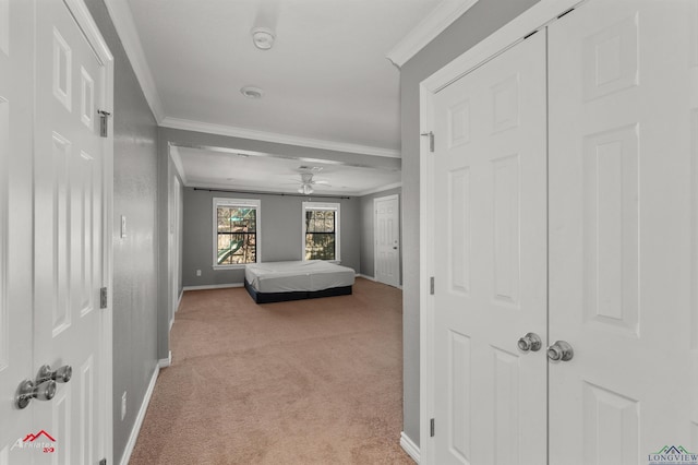 bedroom with light colored carpet and ornamental molding