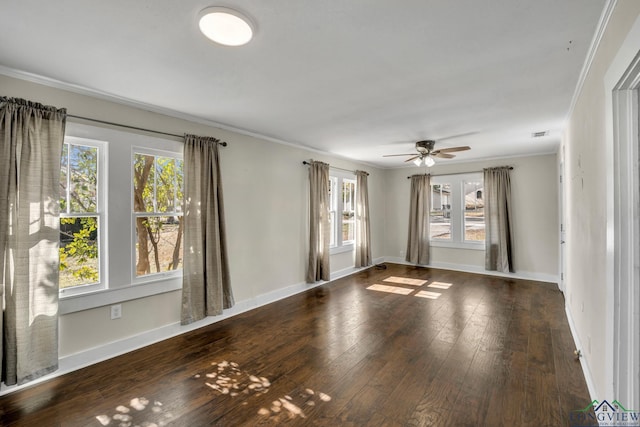 empty room featuring crown molding, ceiling fan, and dark hardwood / wood-style flooring