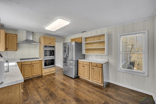 kitchen with light brown cabinetry, wall chimney range hood, dark wood-type flooring, and stainless steel appliances