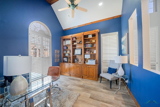 office area with high vaulted ceiling, ceiling fan, baseboards, and light wood-style floors