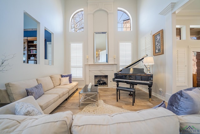 living room with plenty of natural light and wood finished floors