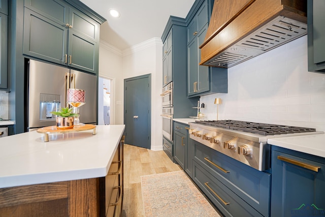 kitchen featuring custom exhaust hood, stainless steel appliances, light countertops, crown molding, and backsplash