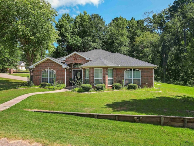 ranch-style house featuring a front lawn