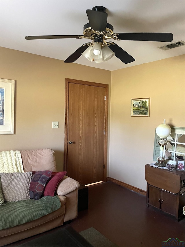 living room with ceiling fan