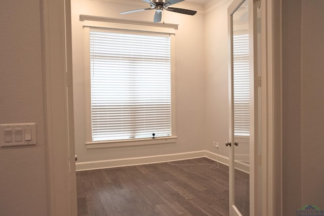 9173 Cave Branch Cv, Tyler, TX 75703 - spare room featuring baseboards, a ceiling fan, and dark wood finished floors