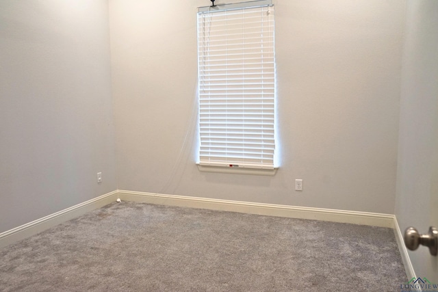 9173 Cave Branch Cv, Tyler, TX 75703 - spare room featuring carpet floors and baseboards