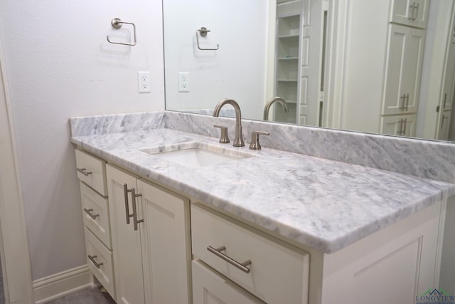 9173 Cave Branch Cv, Tyler, TX 75703 - bathroom with baseboards and vanity