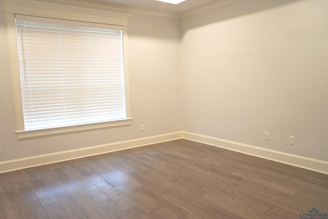 9173 Cave Branch Cv, Tyler, TX 75703 - empty room with dark wood-type flooring and baseboards