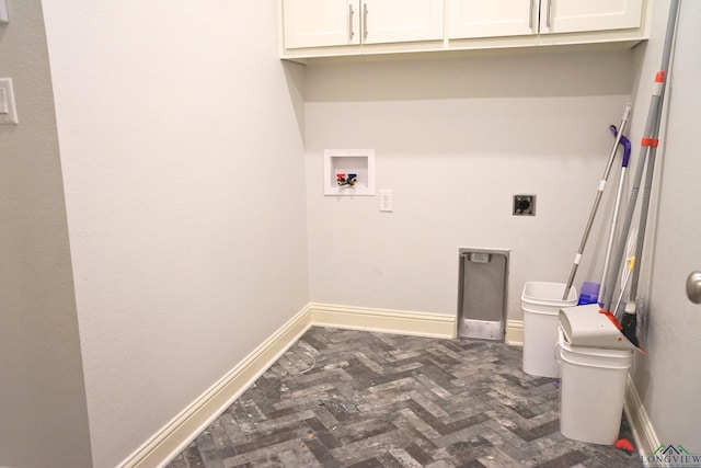 9173 Cave Branch Cv, Tyler, TX 75703 - laundry room with washer hookup, electric dryer hookup, brick floor, baseboards, and cabinet space