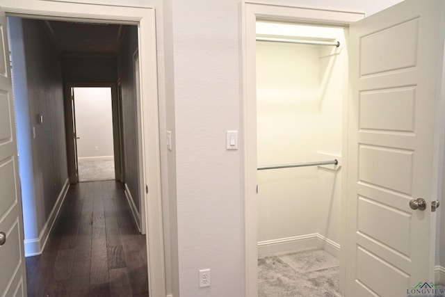 9173 Cave Branch Cv, Tyler, TX 75703 - corridor with baseboards and dark wood finished floors