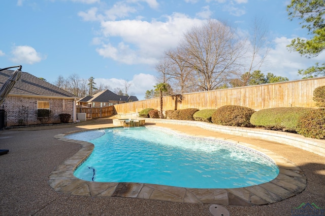 view of swimming pool featuring a patio area, a fenced backyard, and a fenced in pool