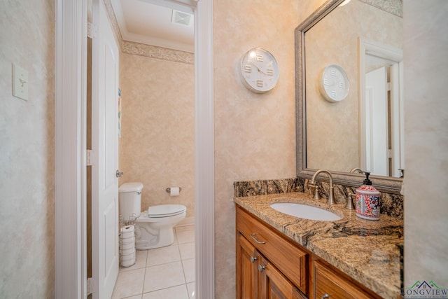 bathroom featuring toilet, tile patterned flooring, visible vents, and vanity