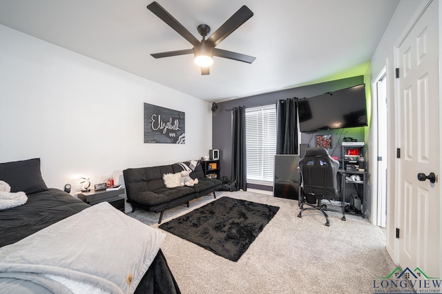 carpeted bedroom featuring ceiling fan