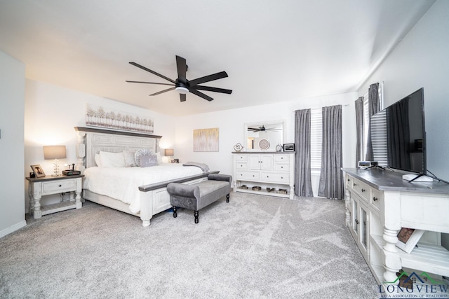 bedroom featuring ceiling fan and light colored carpet