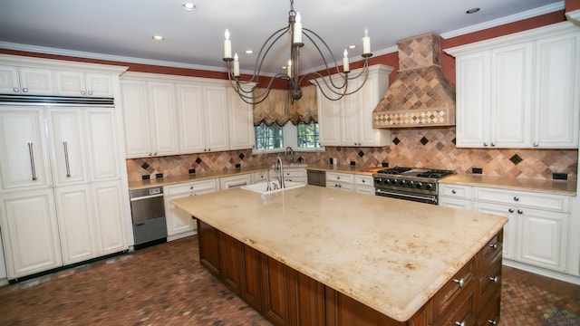 kitchen featuring stainless steel range, a center island with sink, white cabinets, and custom exhaust hood