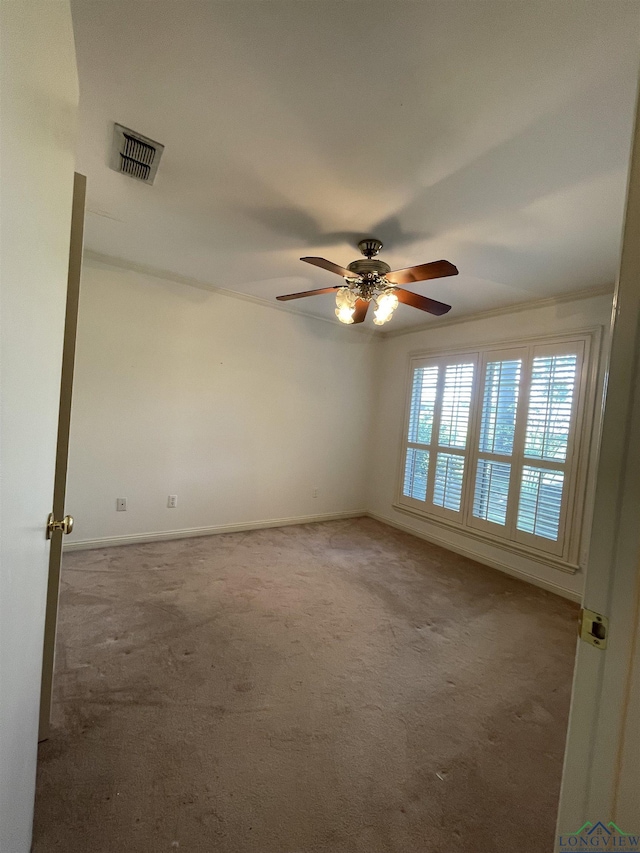 1404 Stonebriar Dr, Carthage, TX 75633 - carpeted spare room with a ceiling fan and baseboards