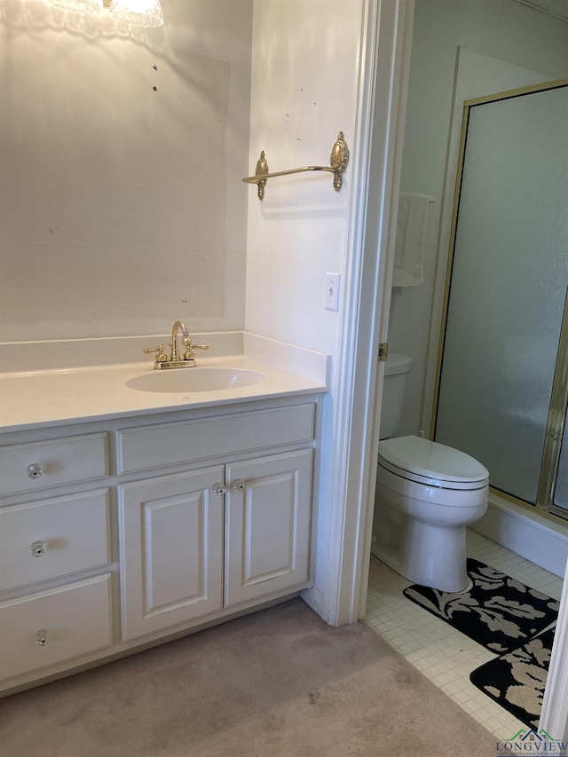 1404 Stonebriar Dr, Carthage, TX 75633 - full bathroom featuring toilet, a stall shower, and vanity