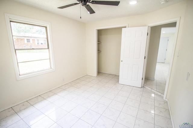 180 Martha St, Waskom, TX 75692 - unfurnished bedroom with a ceiling fan and a closet