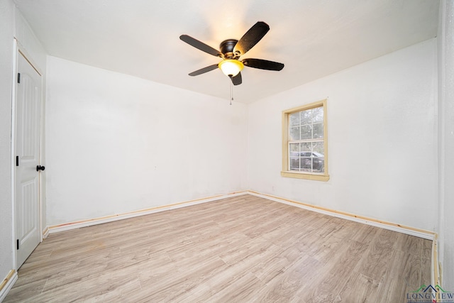 unfurnished room featuring ceiling fan and light hardwood / wood-style floors