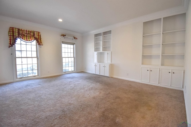 unfurnished living room with carpet floors and ornamental molding