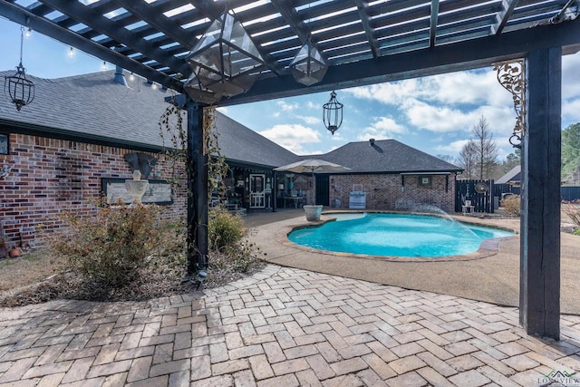 pool featuring fence, a pergola, and a patio