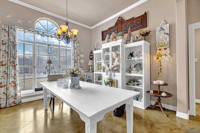 dining area with a healthy amount of sunlight, baseboards, ornamental molding, and a notable chandelier