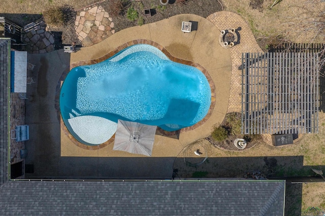 view of pool with fence